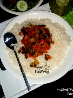 A picture of White rice with source by s@lma ful@rny...