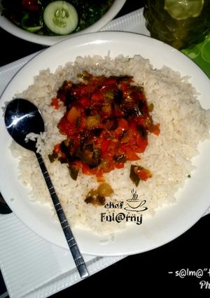 A picture of White rice with source by s@lma ful@rny...