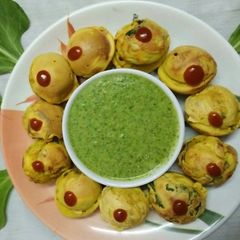 A picture of #Ramdan Batata vada in appe pan.