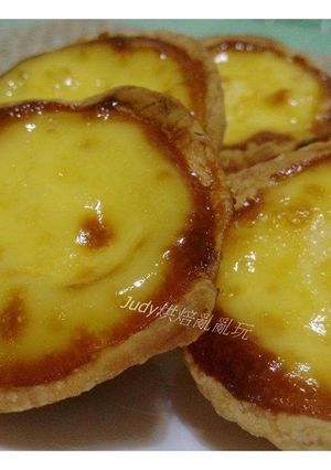 A picture of Portuguese Egg Tarts (Homemade Tart Crust).
