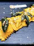 Ravioli di semola alla paprika, ripieni di cosciotto di maiale al pimenton