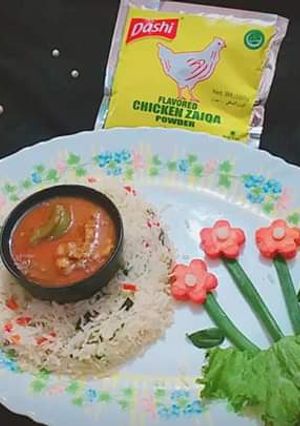 A picture of Jalfrezi with fried rice.