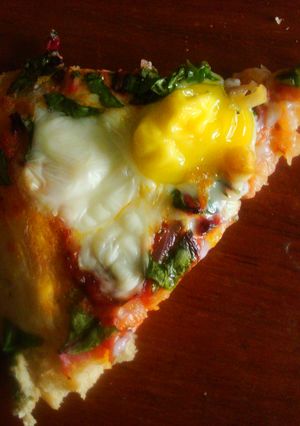 A picture of Quail Egg and Beet Leaves Wholewheat Pizza.