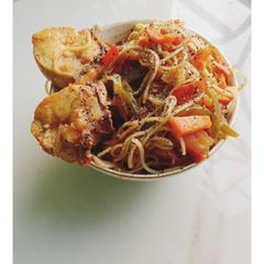 A picture of Street style wet chicken noodles.
