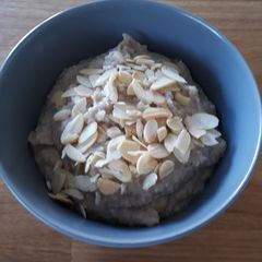 A picture of Coconut and banana oat bran porridge.