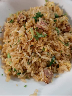 Una foto de Arroz con magret de pato