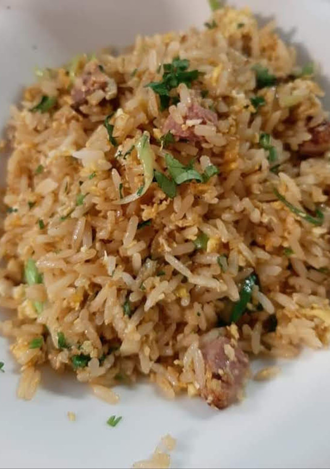 Una foto de Arroz con magret de pato