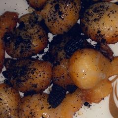 A picture of Puff puff with crushed Oreo.