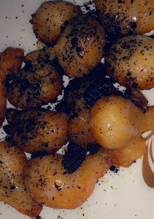 A picture of Puff puff with crushed Oreo.