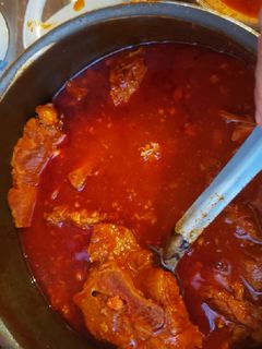 Una foto de Espinazo de cerdo con caldo