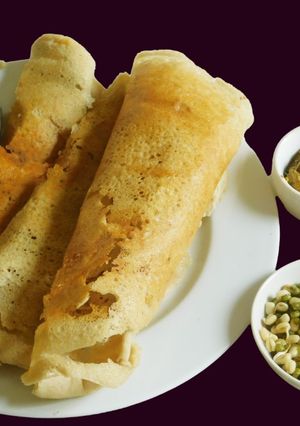 A picture of LUNCH IS SERVED: Little millet dosai with onion sambar, curry leaf chutney and mung sprouts.