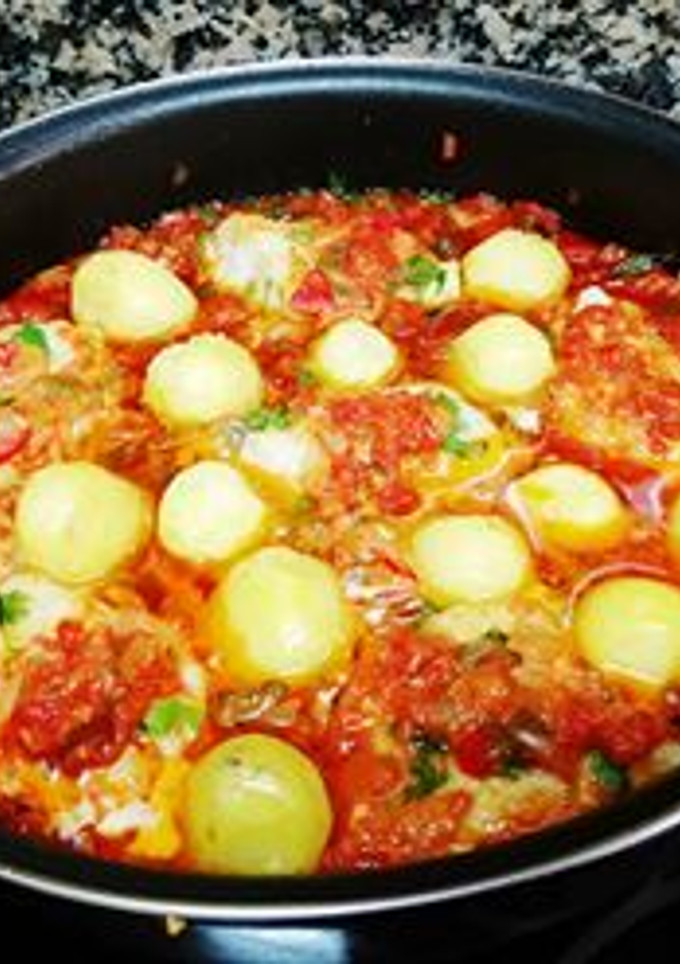 Una foto de Lomos de bacalao en salsa