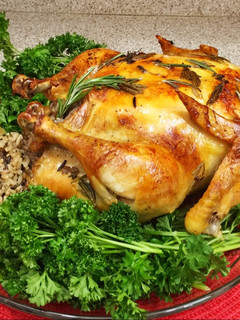 Una foto de Pollo asado con Romero y relleno con arroz silvestre (Al Horno)