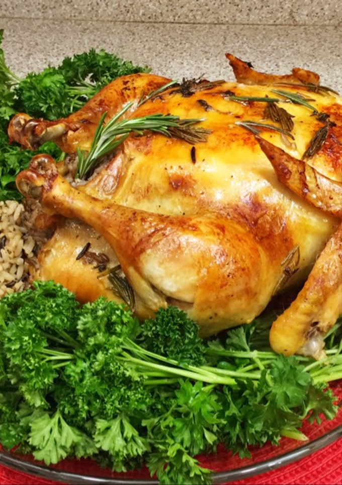 Una foto de Pollo asado con Romero y relleno con arroz silvestre (Al Horno)