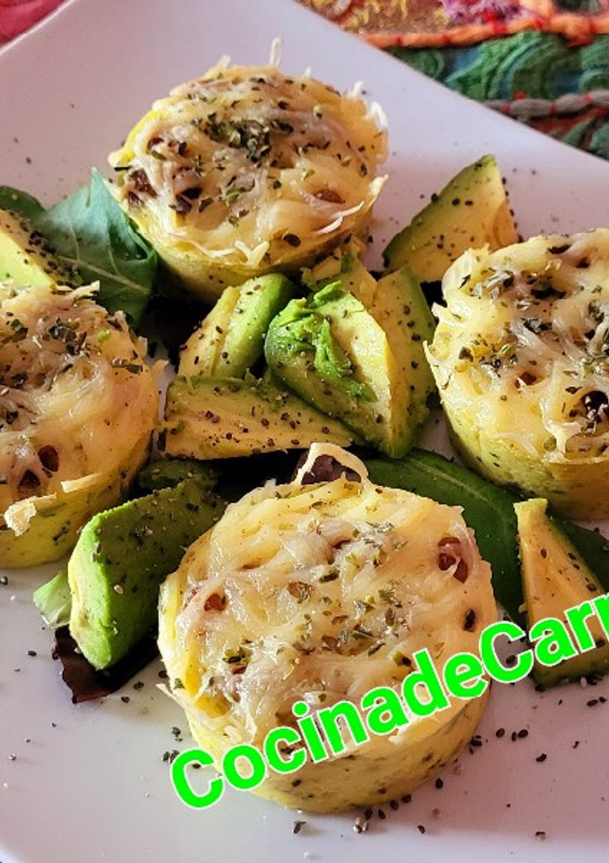 Una foto de Budines de pan y calabacín con pasas
