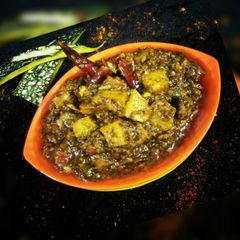 A picture of Spinach and pumpkin curry.
