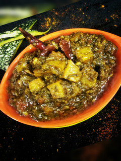 A picture of Spinach and pumpkin curry.