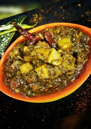 A picture of Spinach and pumpkin curry.