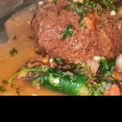 A picture of Ragi Mudde with instant Hasi Gojju.