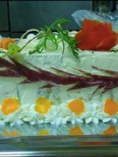 Una foto de Pastel de champiñón con curry y parmesano