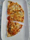 Pizza calzone bonito del norte en freidora de aire