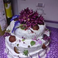 A picture of #vanilla mango pulp gulub jamun cake with natural flowers..