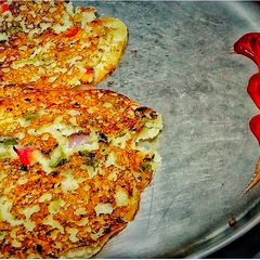A picture of Suji Uttapam.
