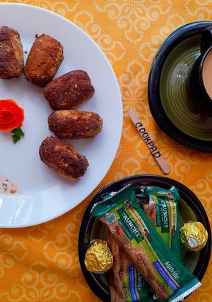 A picture of Gola Kabab with Tea & Snacks.