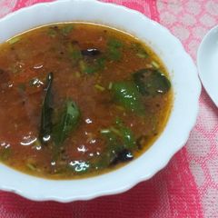 A picture of Tomato Rasam (Thakkali Rasam).