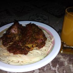 Spag with chicken sauce and orange tiara A picture of Spag with chicken sauce and orange tiara.