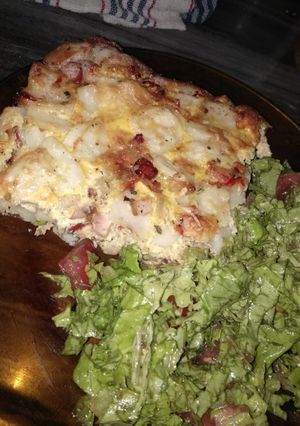 Una foto de Tortilla de papa armada en crudo al horno