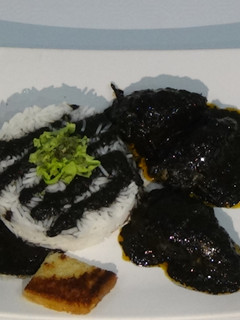 Una foto de Txipirones en su tinta