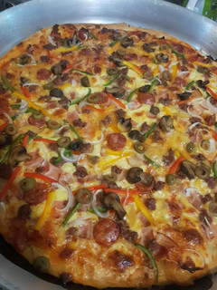 Una foto de Pizza casera all the way!