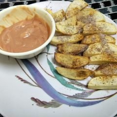 A picture of Potato wedges.