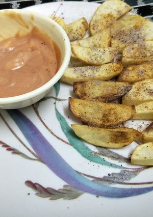A picture of Potato wedges.