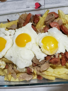 Una foto de Chorrillana casera con sazón de janny