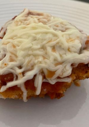 Una foto de Pechuga Parmesana
