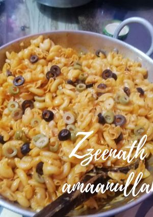 A picture of Olives Loaded Cheesy Desi Style Macaroni.