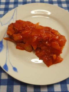 Una foto de Bacalao con tomate