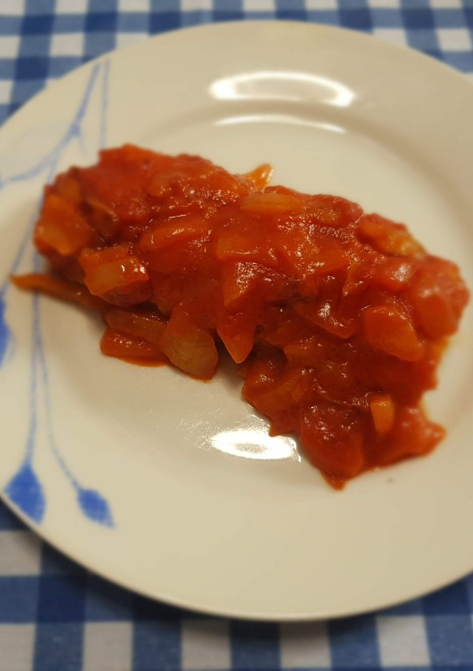 Una foto de Bacalao con tomate
