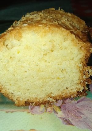 Una foto de Torta 10 cucharadas de naranja y coco🙂