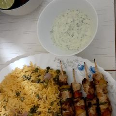 A picture of Chicken Mshkaki/veggie fried rice/yoghurt dip(trial and error)😋.