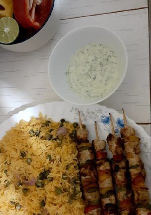 A picture of Chicken Mshkaki/veggie fried rice/yoghurt dip(trial and error)😋.
