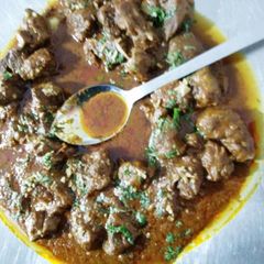 A picture of Tawa chicken (tomato base).