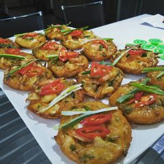 A picture of Vegetables and prawn fritters.