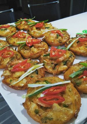 A picture of Vegetables and prawn fritters.