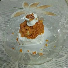 A picture of Gajar ka Halwa with ice-cream.