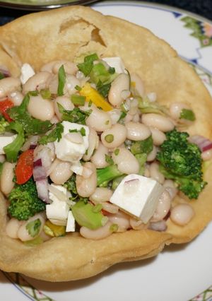 A picture of White Bean Salad with Broccoli and Goat Cheese in Edible Tortilla Bowls, Jon Style.