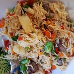A picture of Meat ball vegetable stir fry pasta.