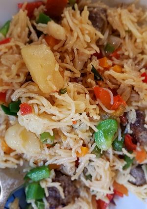A picture of Meat ball vegetable stir fry pasta.